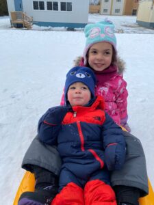 grandchildren sledding